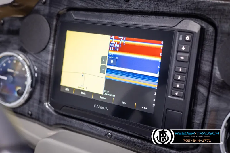 Slide: The Image of Garmin marine display on 2025 Tahoe TGO RF dashboard with sonar and navigation features. - 29
