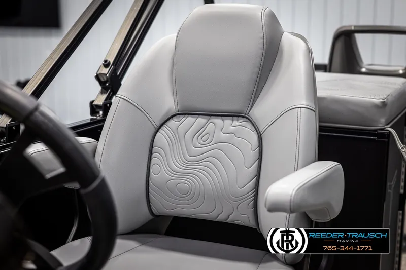 Slide: The Image of Gray leather seat with contour design in a 2025 Tahoe TGO RF boat. - 31