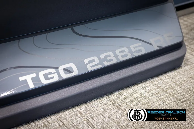 Slide: The Image of 2025 Tahoe TGO RF boat detail with TGO 2385 RF branding, Reeder-Trausch Marine logo. - 47