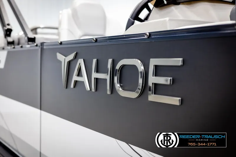 Slide: The Image of 2025 Tahoe TGO RF boat side view with logo and Reeder-Trausch Marine branding. - 48