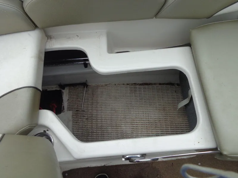 Slide: The Image of 2007 Sea Ray 200 Sundeck storage compartment with seating area. - 30