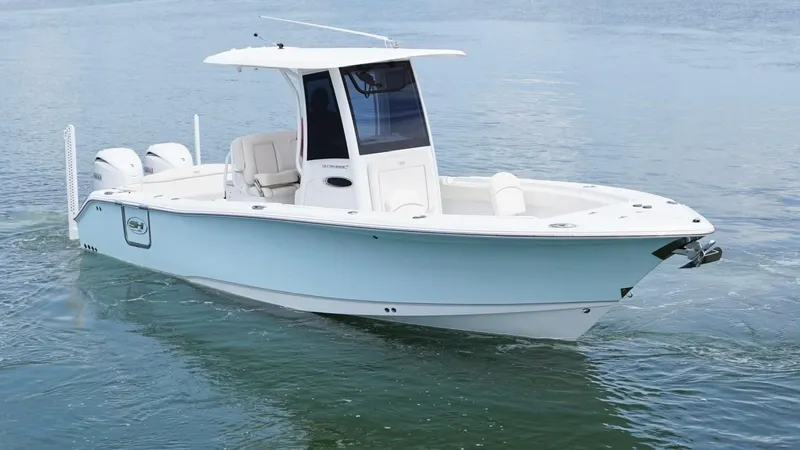 Slide: The Image of 2024 Sea Hunt Ultra 265 SE boat on calm water. - 4