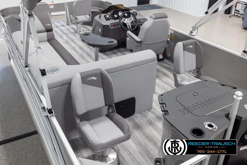 Slide: The Image of 2025 Bennington 21 SFSE pontoon boat interior with modern seating and steering console. - 11