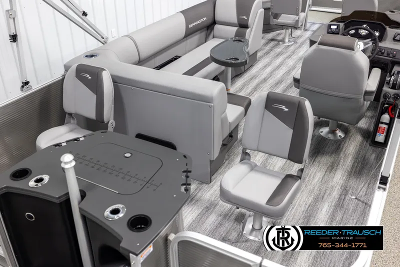 Slide: The Image of 2025 Bennington 21 SFSE pontoon boat interior with gray seating and modern design. - 12
