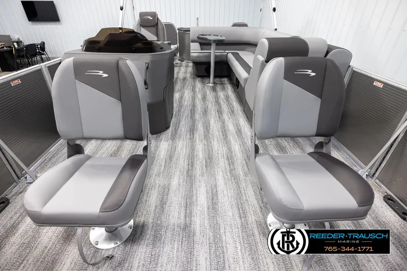 Slide: The Image of 2025 Bennington 21 SFSE boat interior with gray seating and modern design. - 13