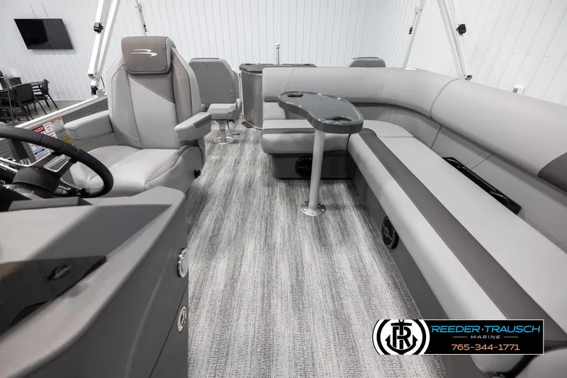 Slide: The Image of 2025 Bennington 21 SFSE boat interior with gray seating and modern design. - 14