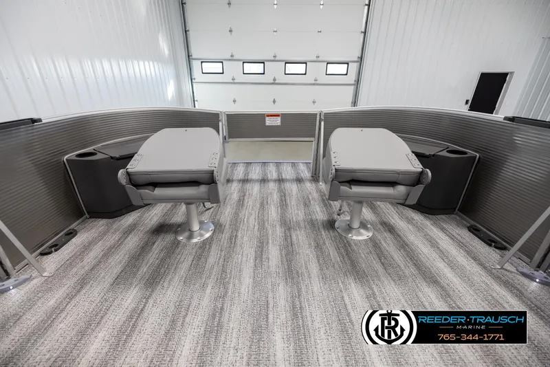 Slide: The Image of 2025 Bennington 21 SFSE boat interior with gray seating and modern design. - 19