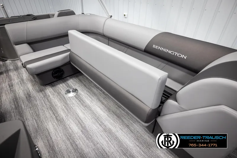 Slide: The Image of 2025 Bennington 21 SFSE boat interior with gray seating and carpet flooring. - 24