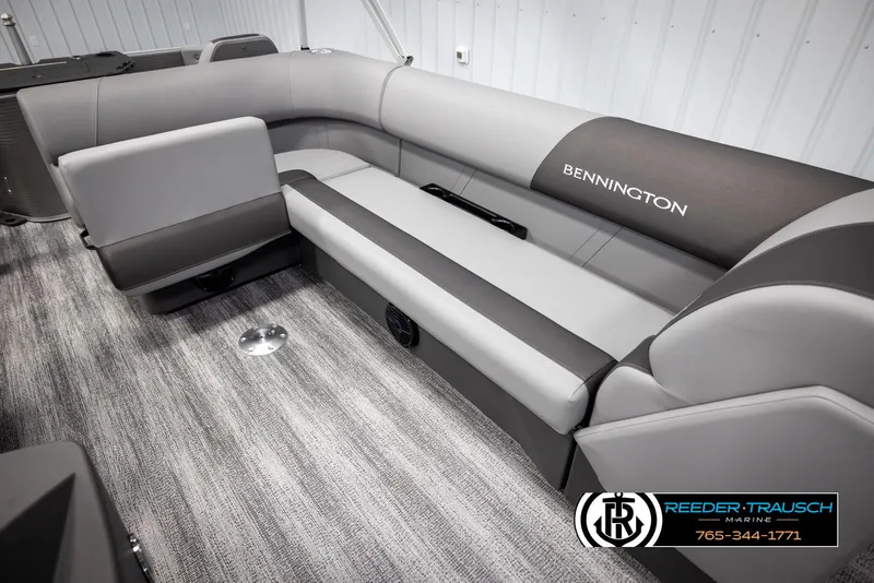 Slide: The Image of 2025 Bennington 21 SFSE boat interior with gray seating and logo. - 25