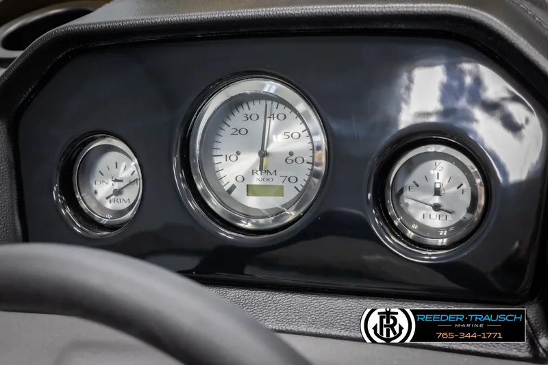 Slide: The Image of Dashboard of 2025 Bennington 21 SFSE boat with RPM, trim, and fuel gauges. - 31