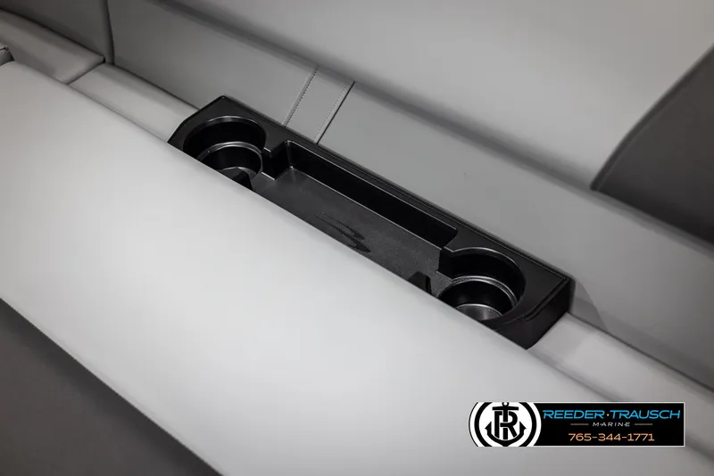 Slide: The Image of 2025 Bennington 21 SFSE boat seat with integrated cup holders and storage. - 37