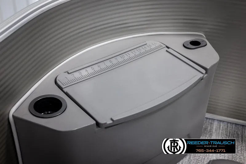 Slide: The Image of 2025 Bennington 21 SFSE boat console with built-in ruler and cup holders. - 42