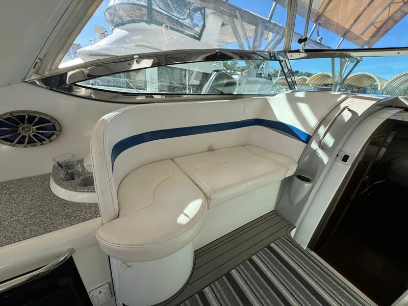 Slide: The Image of 2004 Formula 37 Performance Cruiser interior with white seating and striped flooring. - 14