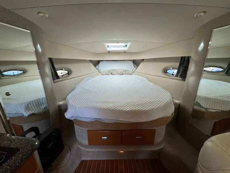 Slide: The Image of Interior of 2004 Formula 37 Performance Cruiser with cozy bed and modern design. - 23