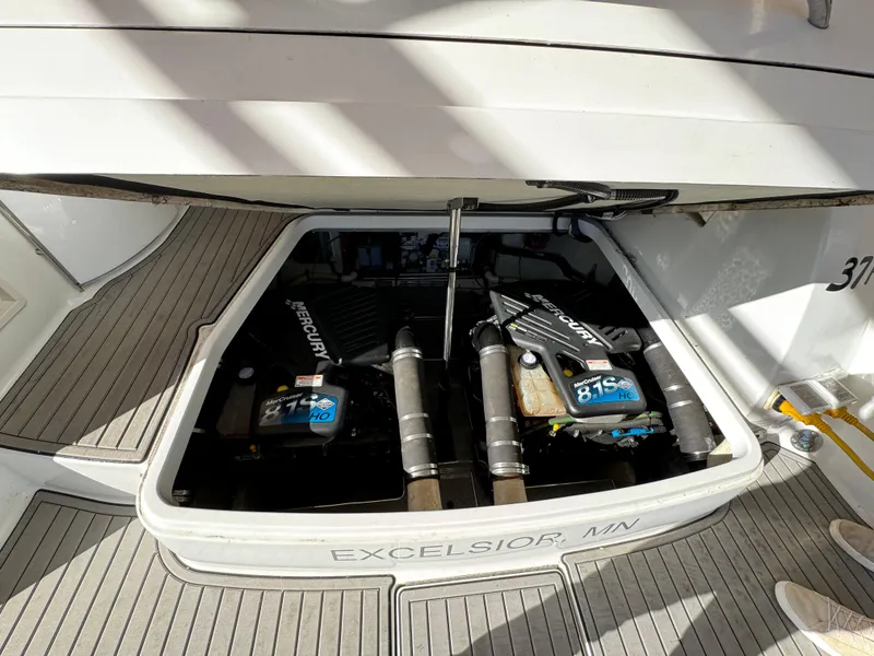 Slide: The Image of Engine compartment of a 2004 Formula 37 Performance Cruiser with twin Mercury engines. - 36