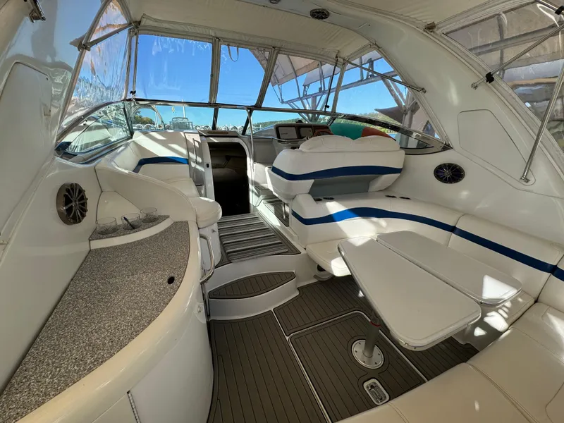 Slide: The Image of 2004 Formula 37 Performance Cruiser interior with seating and helm, featuring modern design elements. - 4