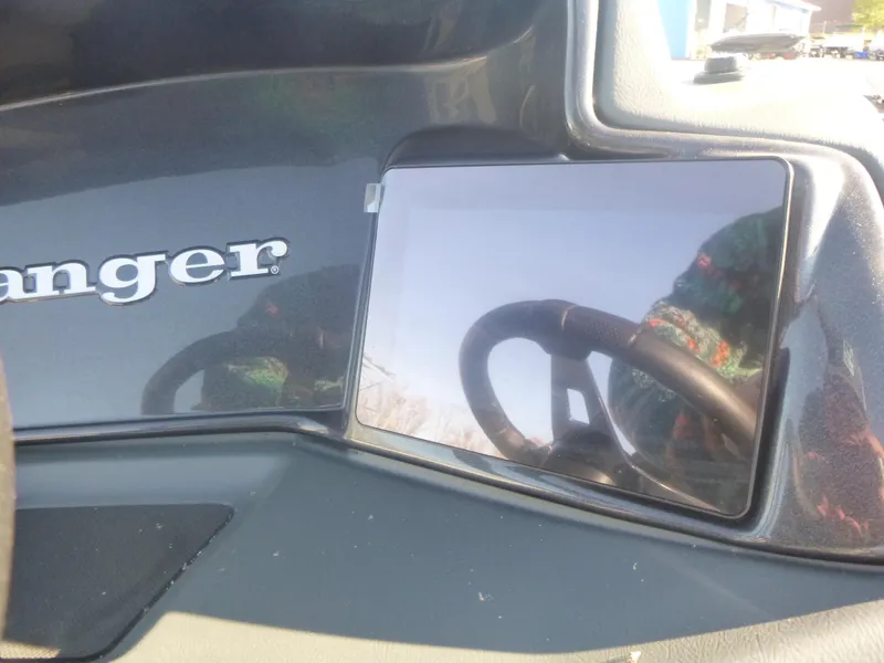 Slide: The Image of 2024 Ranger Reata 223C dashboard with steering wheel reflection. - 15