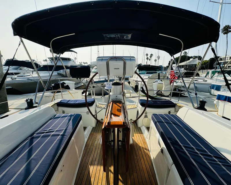Slide: The Image of 2007 Jeanneau Sun Odyssey 36i sailboat cockpit with seating and dual steering wheels. - 11