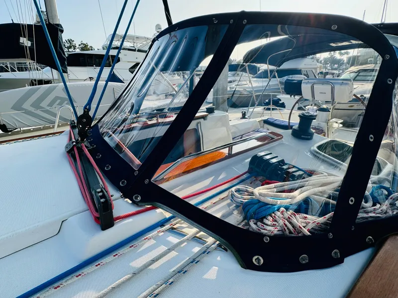 Slide: The Image of 2007 Jeanneau Sun Odyssey 36i sailboat cockpit with ropes and clear canopy. - 15