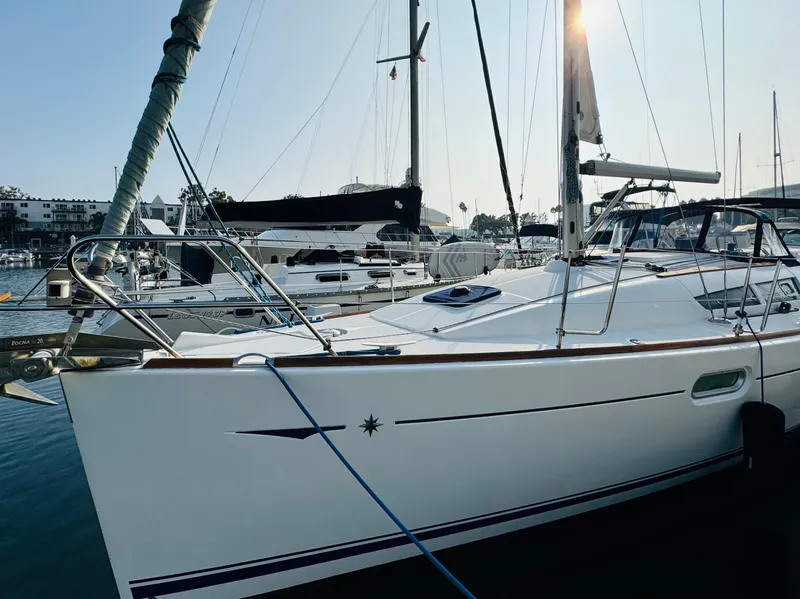 Slide: The Image of 2007 Jeanneau Sun Odyssey 36i sailboat docked in marina, sunny day. - 3