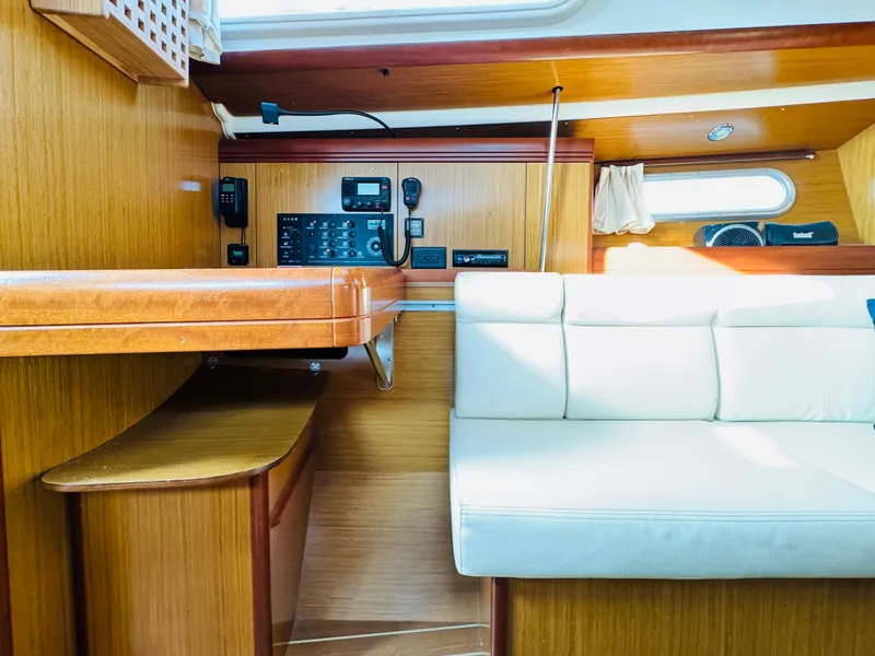 Slide: The Image of Interior of 2007 Jeanneau Sun Odyssey 36i yacht with navigation panel and seating area. - 37
