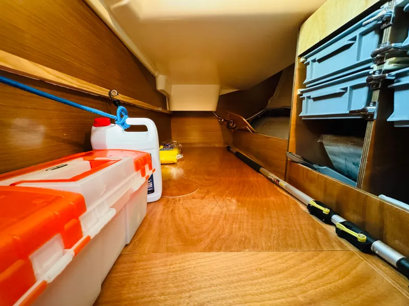 Slide: The Image of Storage compartment in 2007 Jeanneau Sun Odyssey 36i sailboat with tools and equipment. - 40