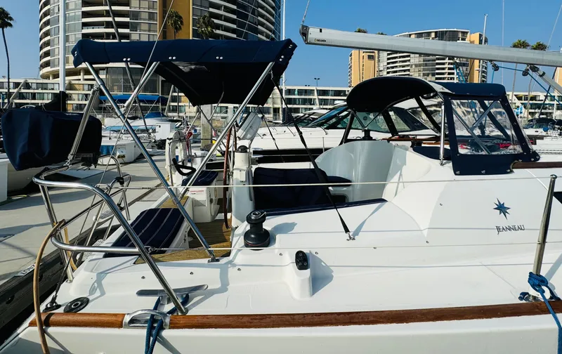 Slide: The Image of 2007 Jeanneau Sun Odyssey 36i sailboat docked in marina, featuring sleek design and modern amenities. - 7