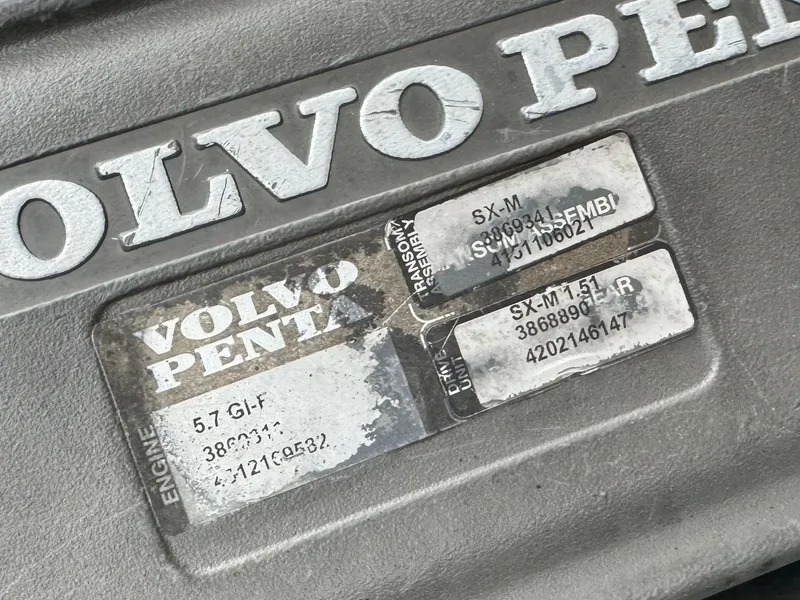 Slide: The Image of 2006 Larson LXi 248 capacity label: 12 persons or 1650 lbs. - 29