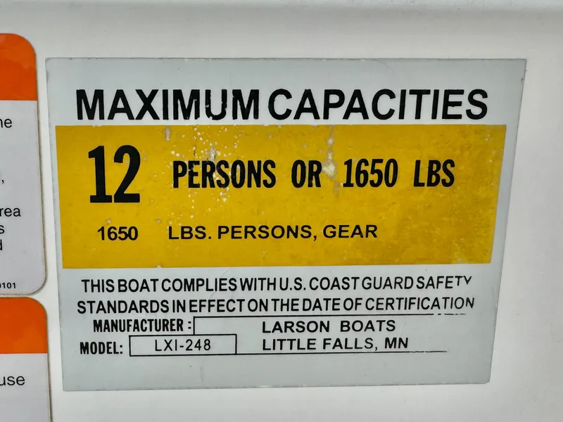 Slide: The Image of Hull identification number on 2006 Larson LXi 248 boat. - 30