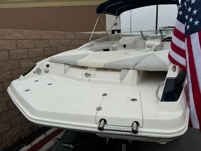 Slide: The Image of Control panel of a 2006 Larson LXi 248 boat with various switches and dials. - 7