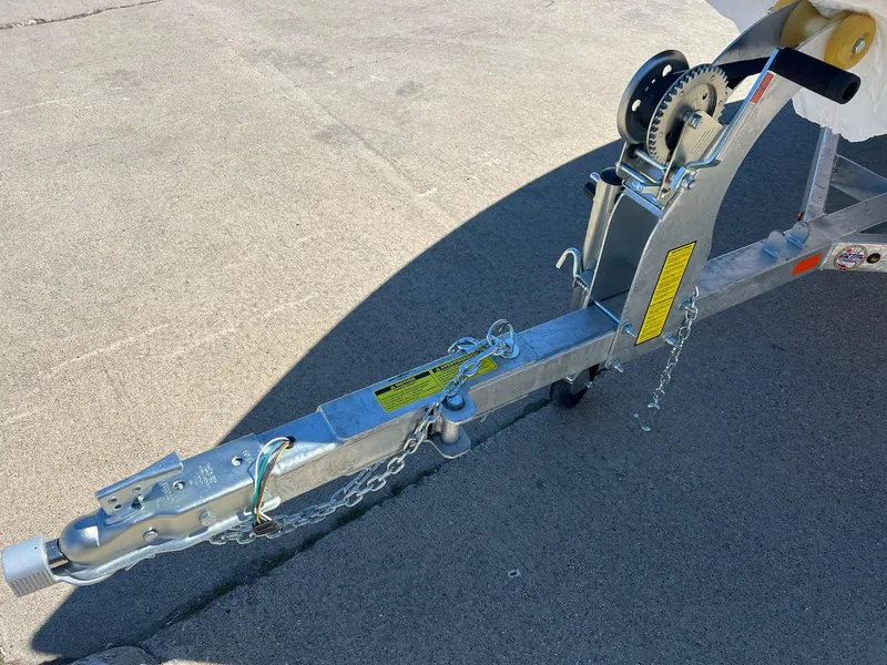 Slide: The Image of Trailer hitch of 2024 Princecraft Holiday 162 DLX WS MAX boat on concrete surface. - 6