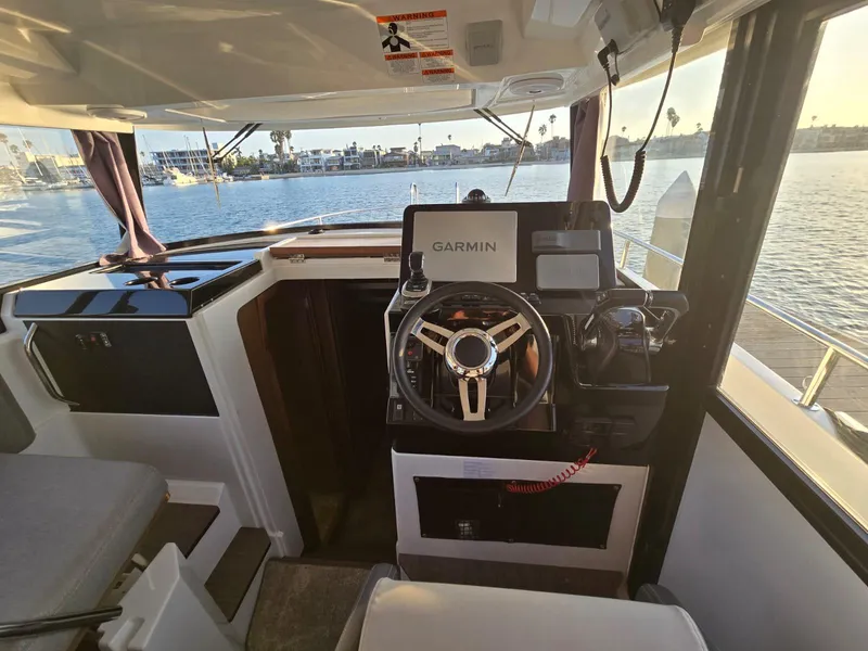 Slide: The Image of Interior view of 2020 Jeanneau NC 895 Sport boat with Garmin navigation system. - 28