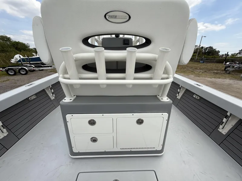 Slide: The Image of 2024 Pathfinder 2600 HPS boat interior with rod holders and storage compartments. - 39