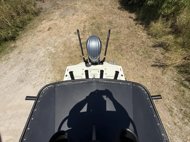 Slide: The Image of Overhead view of 2024 Pathfinder 2500 Hybrid boat on grassy terrain. - 26
