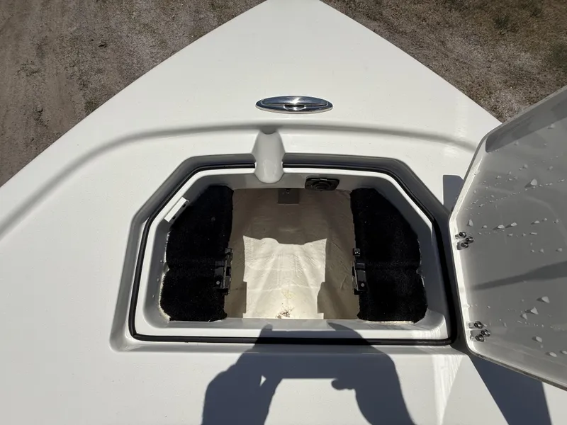 Slide: The Image of Open storage compartment on 2024 Pathfinder 2500 Hybrid boat, viewed from above. - 46