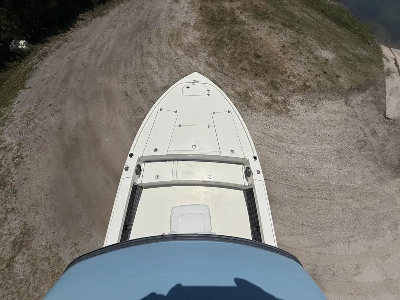 Slide: The Image of Top view of 2024 Pathfinder 2500 Hybrid boat on sandy terrain. - 48