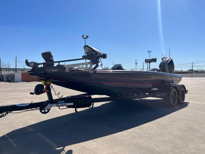 Slide: The Image of 2020 Blazer 625 Pro Elite bass boat on trailer in parking lot. - 11