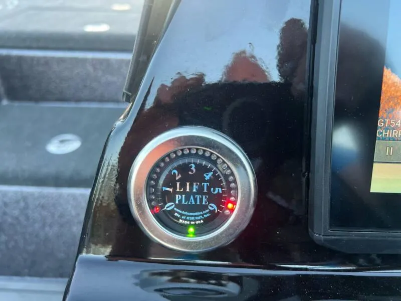 Slide: The Image of 2020 Blazer 625 Pro Elite boat on water, featuring dual seats and motor. - 14