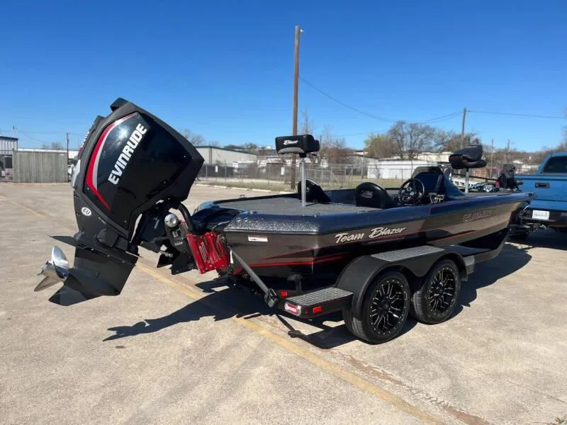 Slide: The Image of 2020 Blazer 625 Pro Elite boat motor and transom detail, featuring red accents. - 2