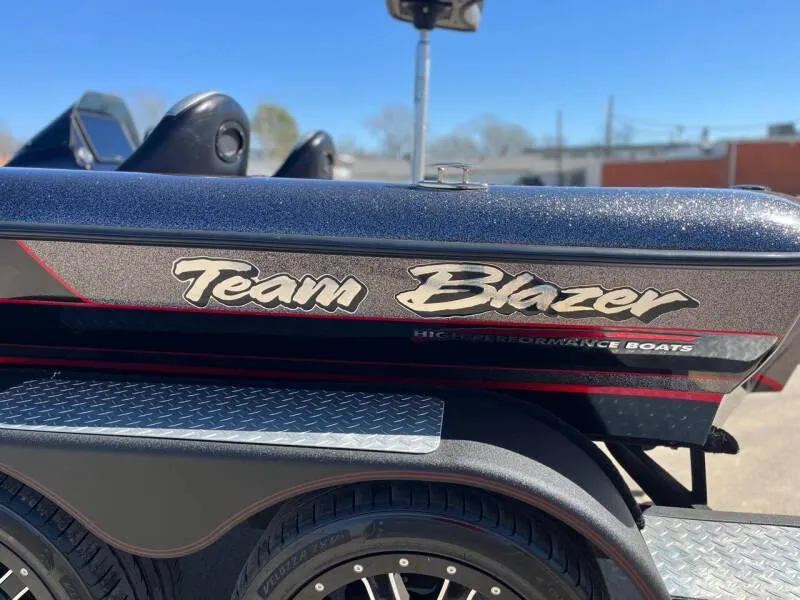 Slide: The Image of 2020 Blazer 625 Pro Elite boat with Team Blazer logo, high-performance design. - 26