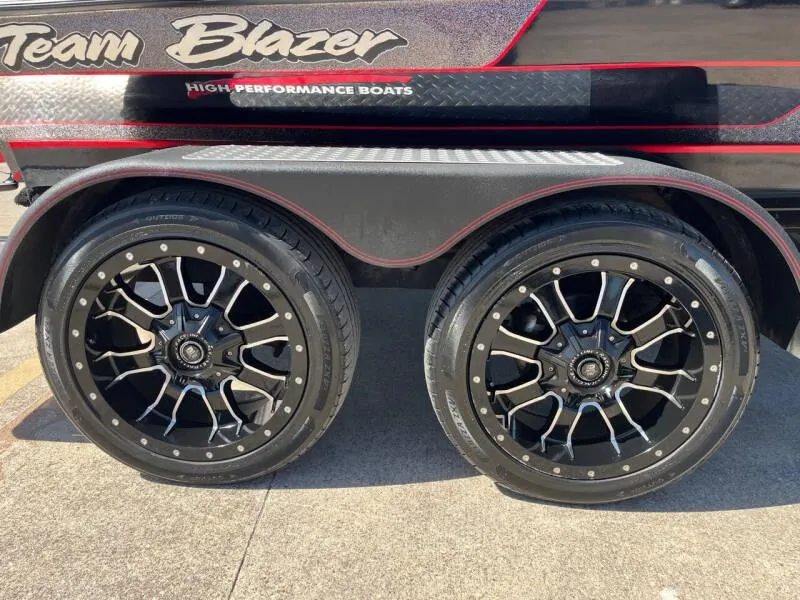 Slide: The Image of 2020 Blazer 625 Pro Elite trailer hitch and winch detail on concrete surface. - 27