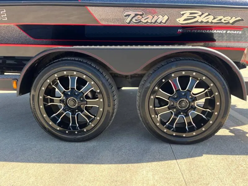 Slide: The Image of 2020 Blazer 625 Pro Elite boat seat with logo, black and gray design. - 28