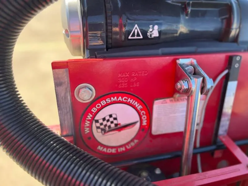 Slide: The Image of 2020 Blazer 625 Pro Elite boat with Evinrude motor on water. - 33