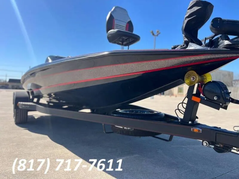 Slide: The Image of 2020 Blazer 625 Pro Elite boat on trailer, contact number visible. - 37