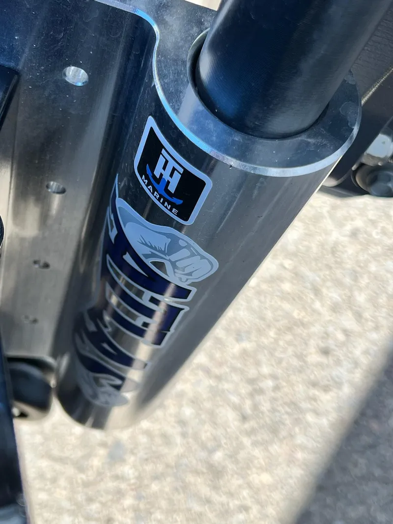 Slide: The Image of Close-up of Skeeter ZXR 21 boat component, featuring marine branding, 2025 model. - 13