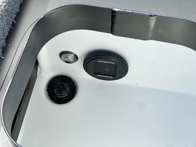 Slide: The Image of 2025 Skeeter ZXR 21 boat compartment with oxygenator and drainage system. - 16