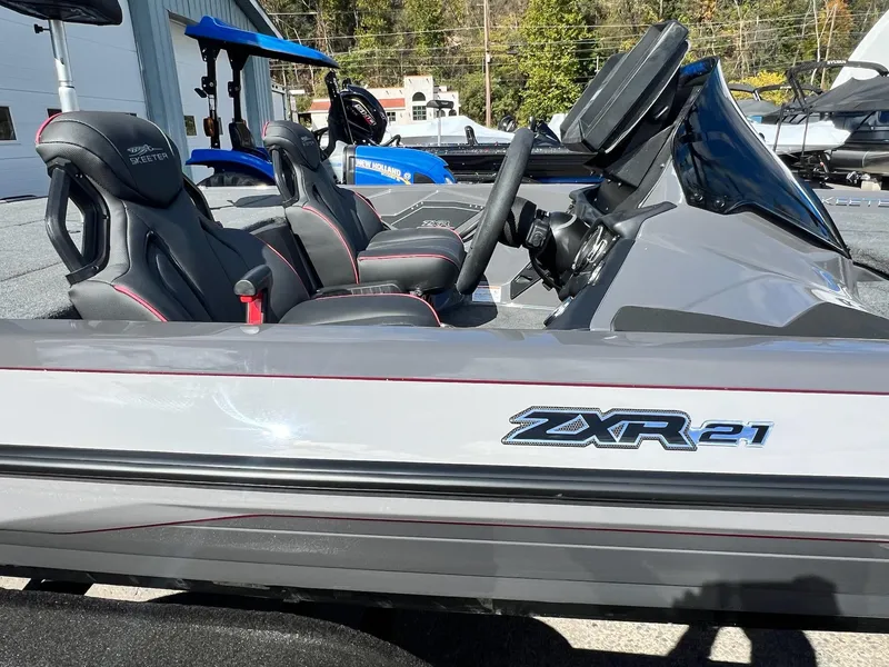 Slide: The Image of 2025 Skeeter ZXR 21 boat with sleek design and modern seating. - 24