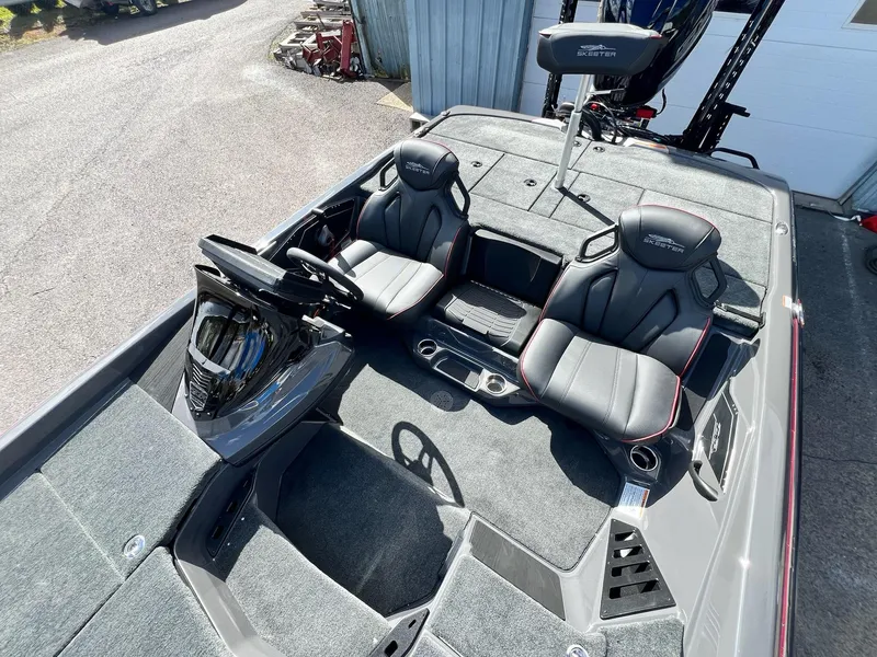 Slide: The Image of 2025 Skeeter ZXR 21 boat interior with dual seats and modern dashboard. - 25