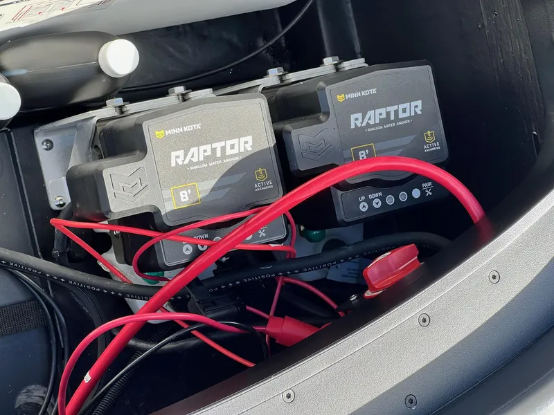 Slide: The Image of Minn Kota Raptor anchors in 2025 Skeeter ZXR 21 boat, featuring active anchoring technology. - 32