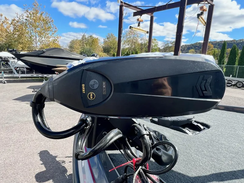 Slide: The Image of Skeeter ZXR 21 boat motor, 2025 model, in outdoor setting with clear sky. - 35